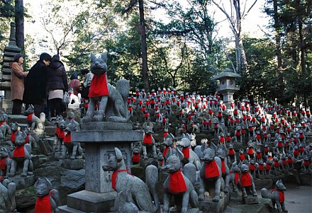 Toyokawa Inari Shrine - Fox Statues in Red Bibs