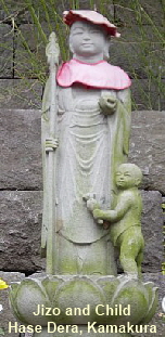 Jizo and child at Hase Dera, Kamakura, Japan