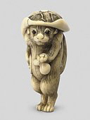 Ivory Tanuki Netsuke. http://www.christies.com/LotFinder/lot_details.aspx?from=searchresults&intObjectID=4981674&sid=f5234657-a43e-4b8a-916c-9d68190804e0