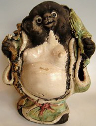 Ceramic Tanuki from Taisho Era (1912-1926). Photo from www.jcollector.com