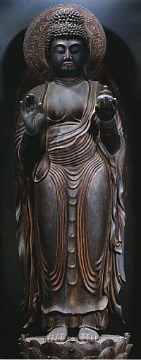 Standing Yakushi. Japan, Heian period, 9th century. Wood, singleblock construction, with touches of polychrome. 169.7 cm. Jingoji, Kyoto Prefecture.