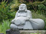 Hotei - stone statue at Zenyo-in in Inatori City