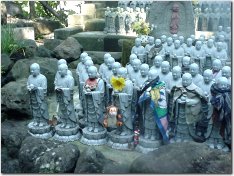 Jizo all dressed up (at Hase Dera in Kamakura)