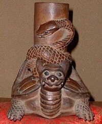 Turtle entwined with snake; photo courtesy of www.rarebooksinjapan.com