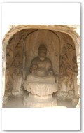 Near Binyang Middle Caves. 500-523AD. Buddha in central position. See prior photo for closeup of side wall.