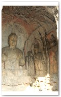 Cave #140, carved btw 500 to 523 AD, Medicine Buddha (Yakushi Nyorai) & attendants.