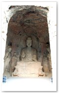 Binyang Middle Caves #140. 500-523AD. Historical Buddha surrounded by two disciples and two Bodhisattva.