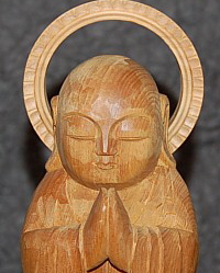 Jizo Praying -- Protector of all sentient beings in the six realms of karmic rebirth.