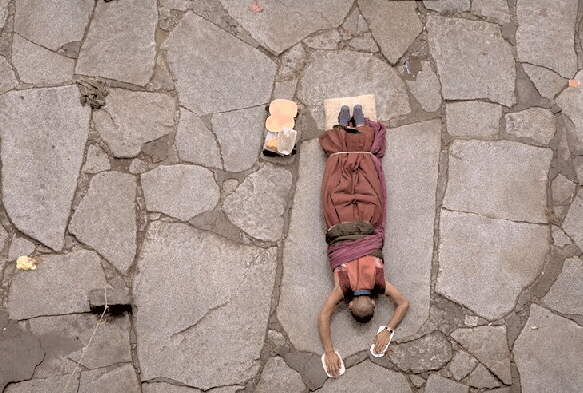 photo by Randy Ulland - Man Praying in Tibet