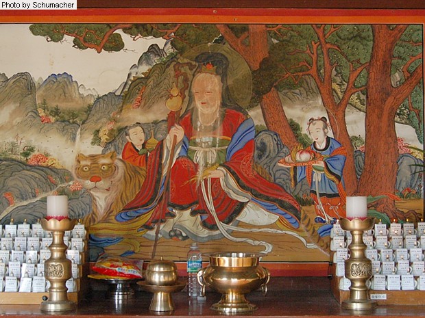 Painting of Tiger & the Mountain Spirit at Gapsa Temple. The Mountain Spirit is one of three spirits worshiped widely in Korea. (1) Mountain Spirit, who governs material wealth and shown with a tiger; (2) Lord of the Big Dipper, who governs human fortune & longevity; and (3) Dokseong, an enlightened hermit who blesses the people. The three also represent (1) Shamanism, (2) Taoism, and (3) Buddhism respectively. 