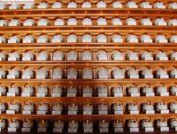 Votive Electric Lamps in the shape of a lotus. Chukseosa Temple. Devotees pay money to purchase said lamps, which are then placed inside a special temple niche.